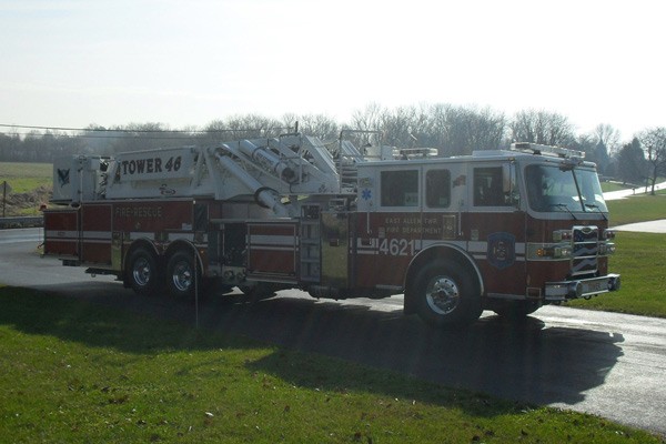 Pierce Arrow XT midmount platform fire truck - new mid-mount aerial sales in PA - passenger front