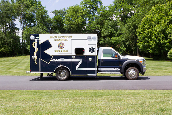 2015 Braun Liberty Type I ambulance - Ford F-450 4x4 - passenger side